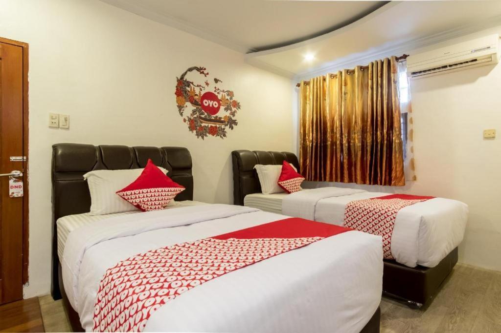 Oyo 619 Naufal Guest House Syariah Medan Buitenkant foto